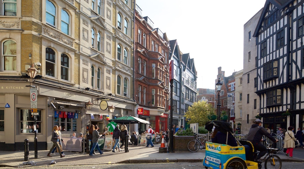 Carnaby Street featuring street scenes, heritage architecture and a square or plaza