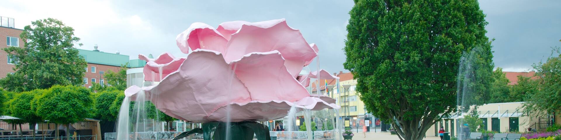 Parque Folkets mostrando una fuente y un parque