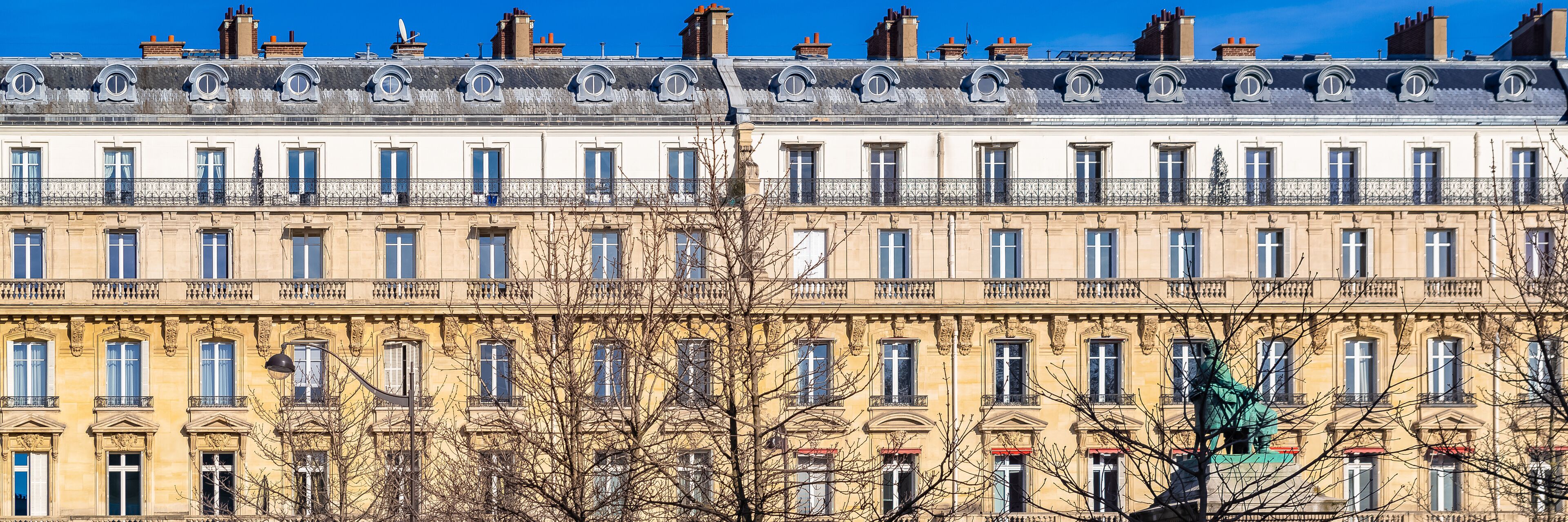 Paris, beautiful buildings in the center, typical parisian facades boulevard de Villiers 