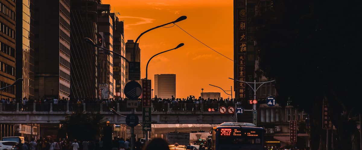 Taipei, Taiwan, 11 Aug 2019: Sun setting along the length of Zhongxiao Road in Taipei city known as taipeihenge