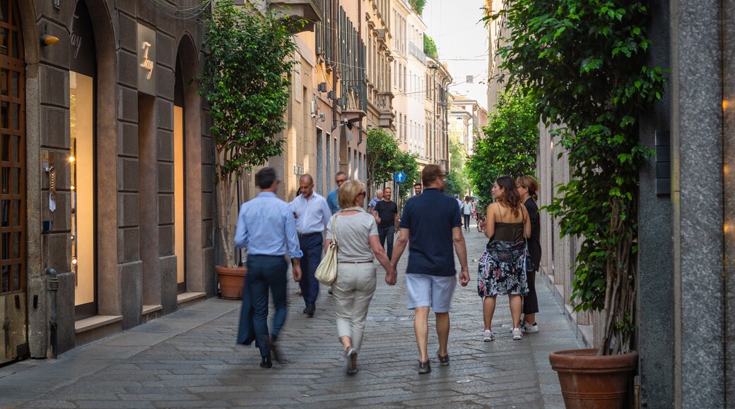 Via Montenapoleone Fashion District featuring street scenes as well as a couple