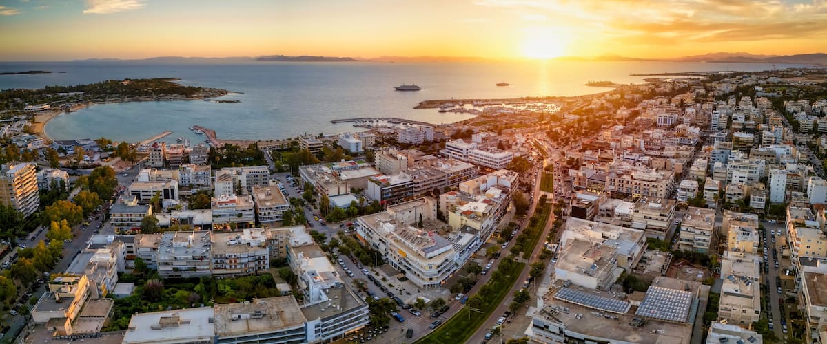 Aerial view of the popuar shopping district of Glyfada, South Athens Riviera, Greece, during a golden sunset