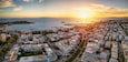 Aerial view of the popuar shopping district of Glyfada, South Athens Riviera, Greece, during a golden sunset