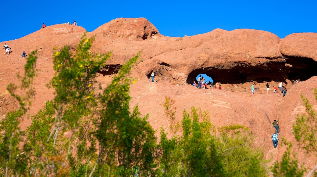 Hole in the Rock showing mountains and climbing