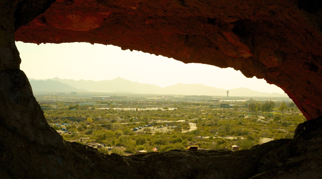 Hole in the Rock featuring desert views and landscape views