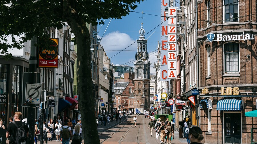 Amsterdam City Centre featuring signage, street scenes and a city