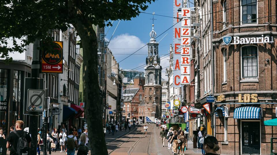 Amsterdam City Centre featuring signage, street scenes and a city