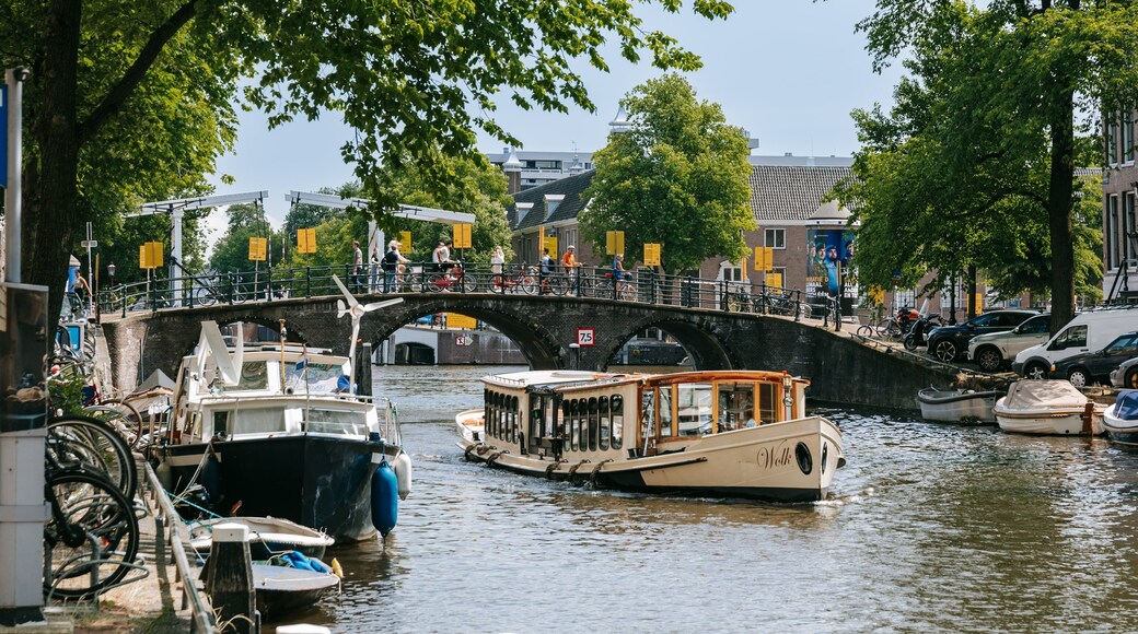 Amsterdam City Centre which includes a river or creek, a bridge and boating