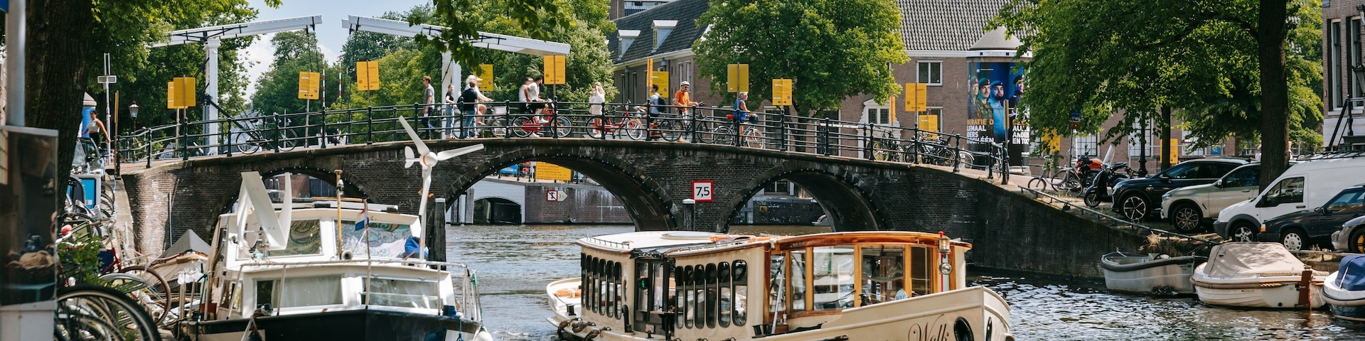 Amsterdam City Centre which includes a river or creek, a bridge and boating
