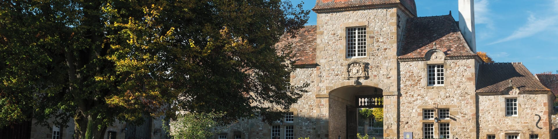 The âPorterieâ, gatehouse views from the gardens. The building now houses artist workshops.