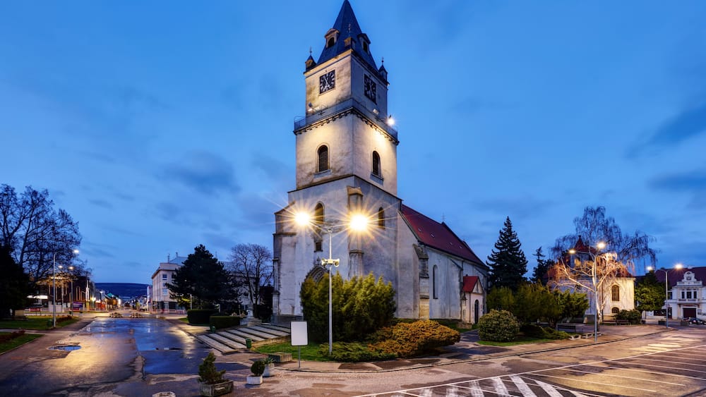 Hlohovec city with church and square at night, Slovakia