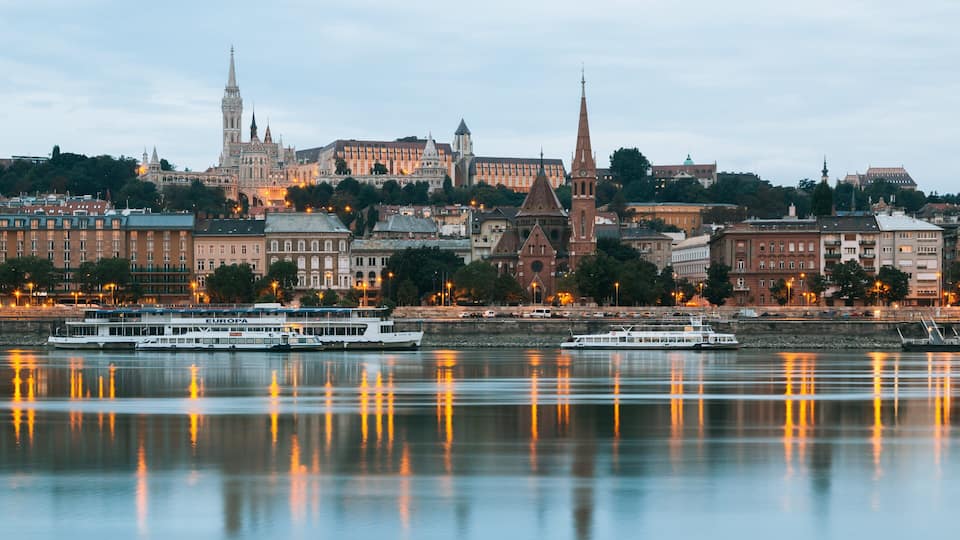 Budapest City Centre which includes a ferry, a city and a river or creek