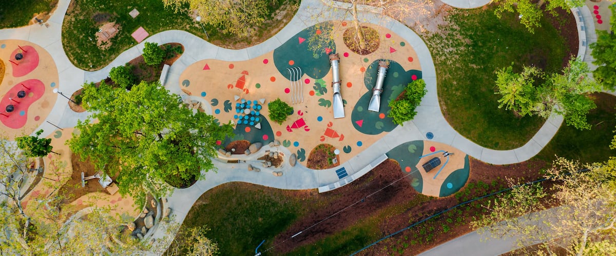 Budapest City park big playground in aerialpanormaic photo. Renwed nice play place for children all ages. Amazing bright morning lights.