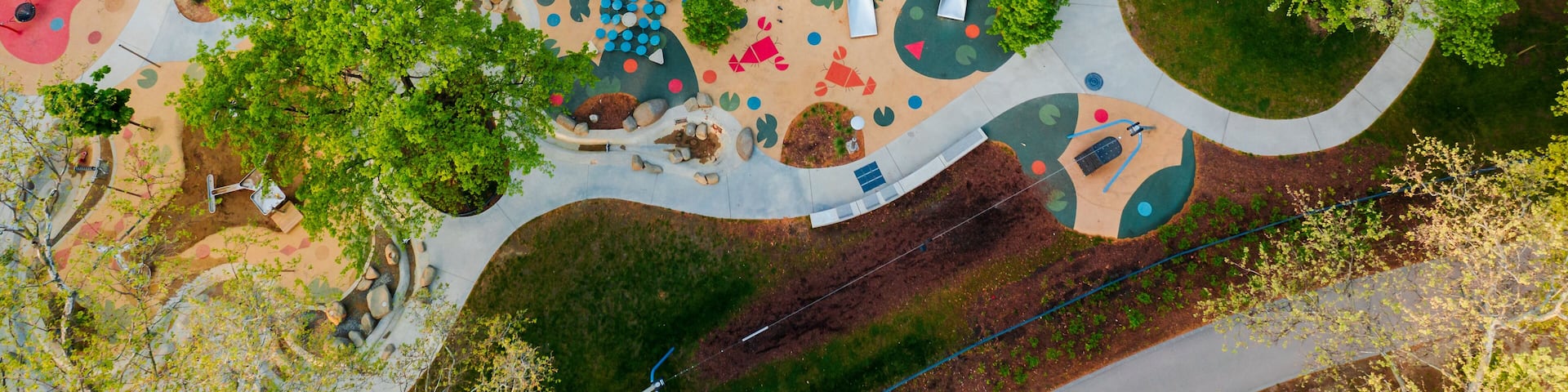 Budapest City park big playground in aerialpanormaic photo. Renwed nice play place for children all ages. Amazing bright morning lights.