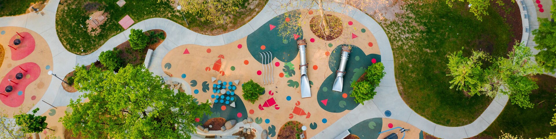 Budapest City park big playground in aerialpanormaic photo. Renwed nice play place for children all ages. Amazing bright morning lights.