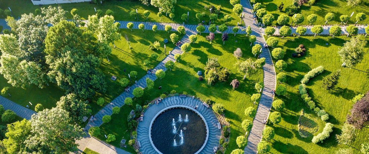 Flying Drone over Park. Central city park, Slatina, Romania.