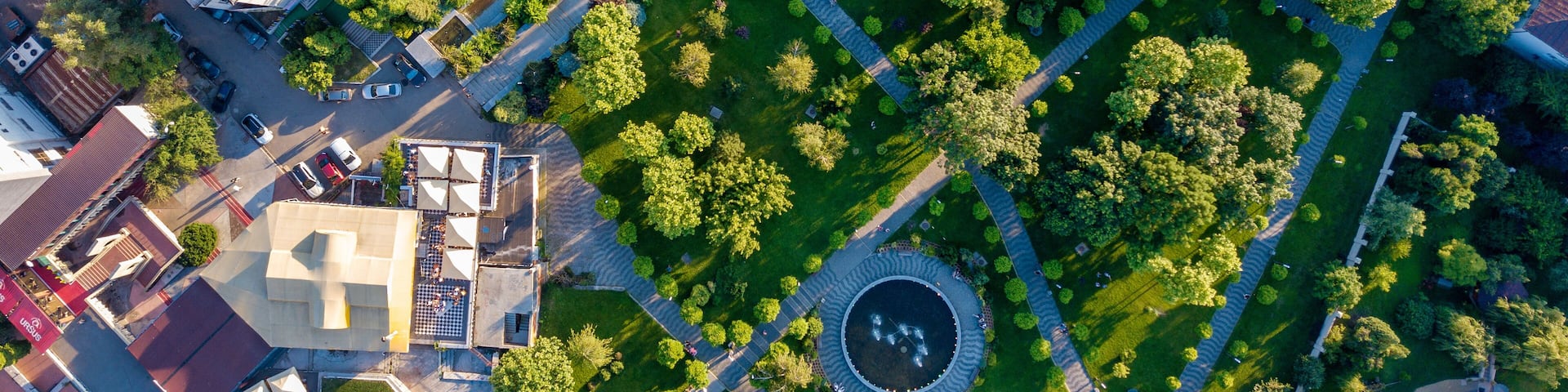 Flying Drone over Park. Central city park, Slatina, Romania.