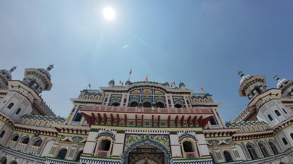 Ornate Exterior Top View of Janaki Temple in Janakpur Nepal Against Clear Blue Sky