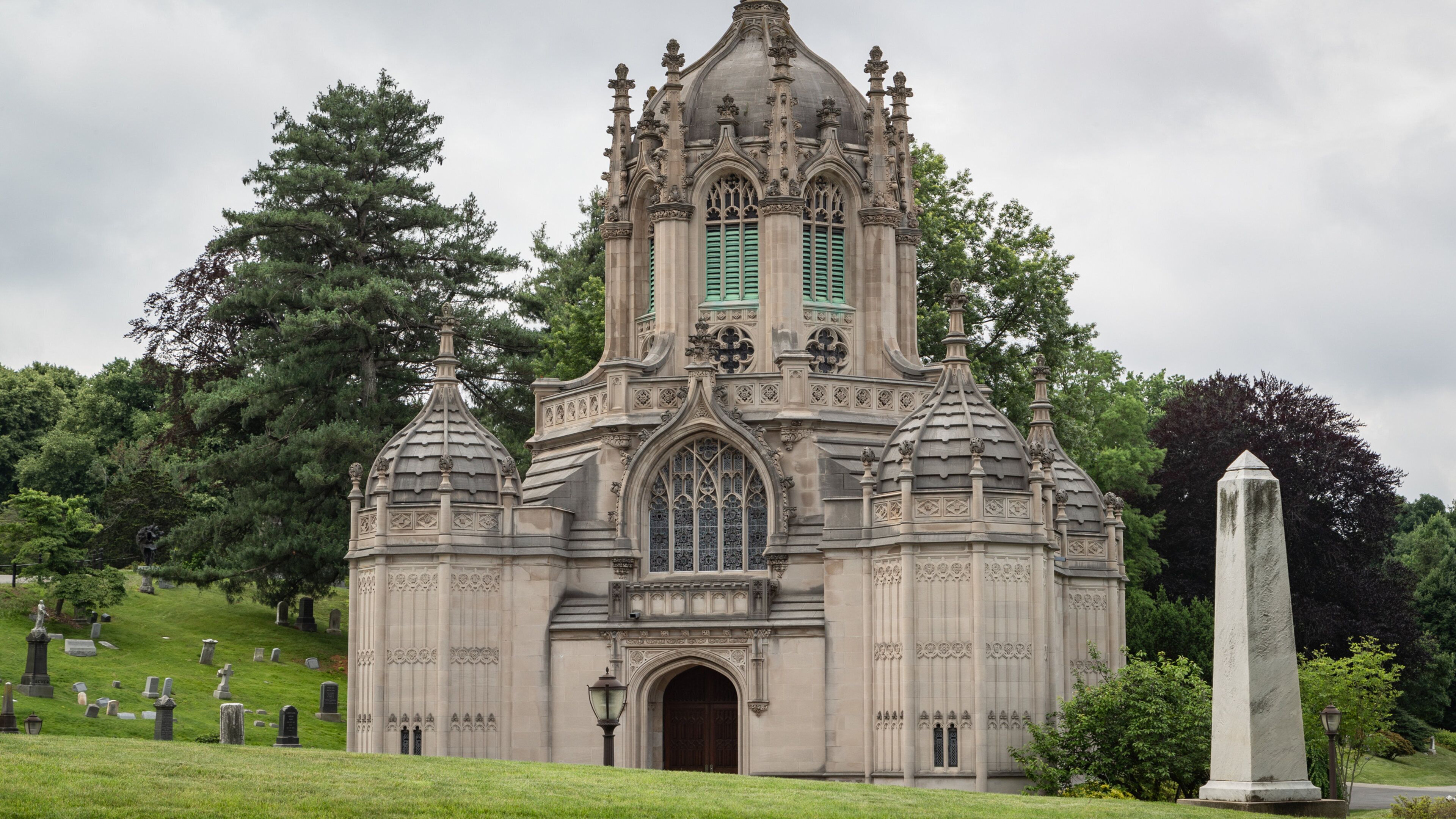 Green-Wood Cemetery featuring a church or cathedral and heritage architecture
