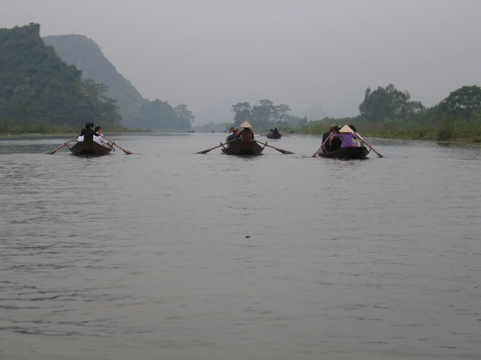 We took a traditional boat to the Perfume Pagoda.  It is tradition that only women oar the boats.