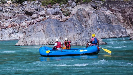 People doing rafting on the river ganges in Rishikesh India