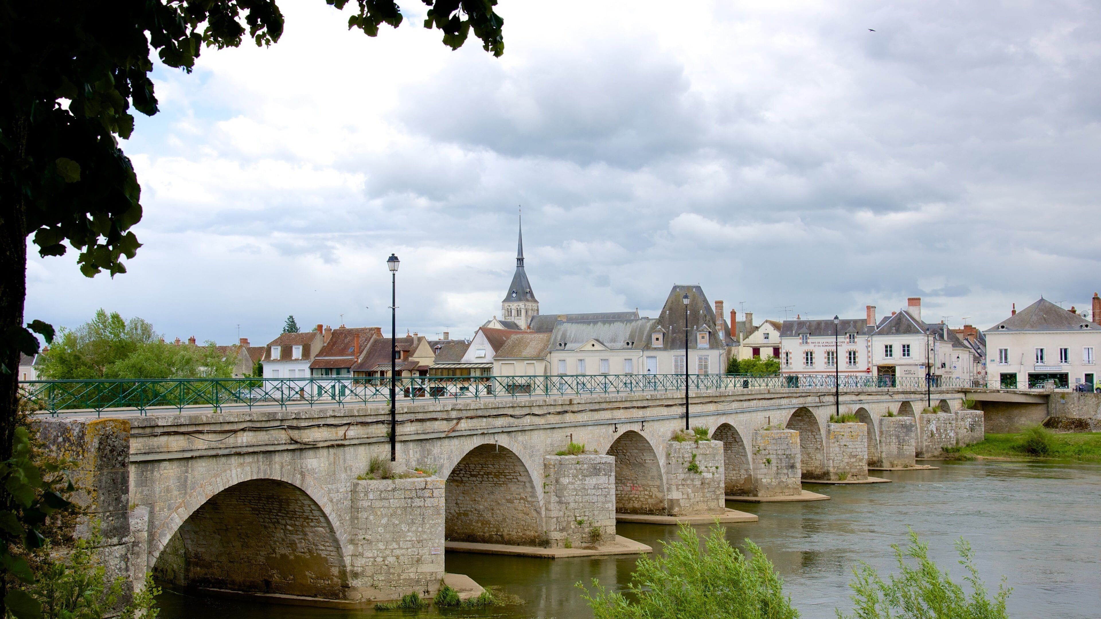 Selles-sur-Cher which includes a bridge and a small town or village