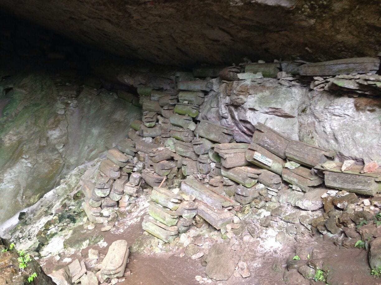 The Sagada Burial Caves is an ancient burial ground full of coffins piled one on top of the other and can be found at the entrance of Lumiang Cave (the start point of the 4-hour cave connection trekking where the exit is the Sumaguing cave)