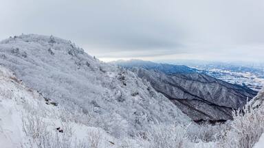 Snow-capped Deogyusan mountains on a clear day in winter, South Korea.