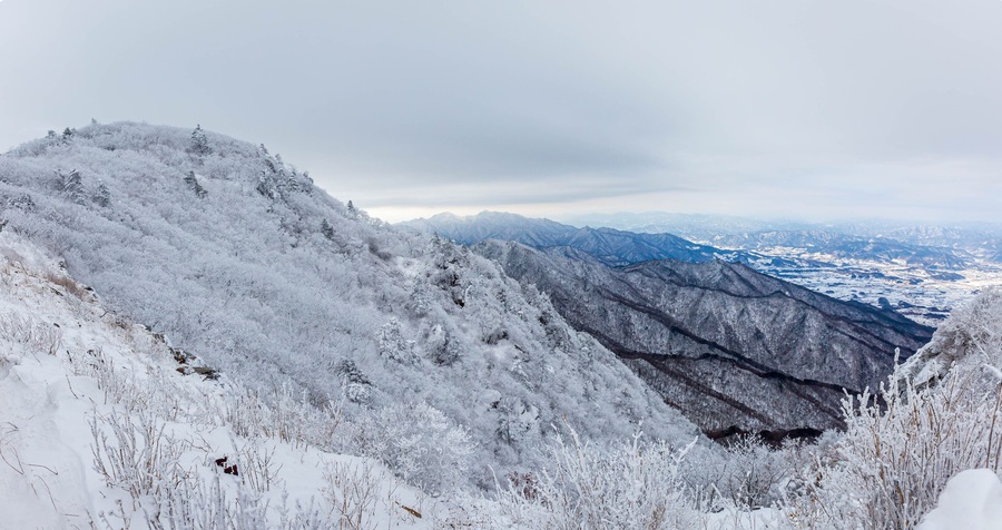 Snow-capped Deogyusan mountains on a clear day in winter, South Korea.