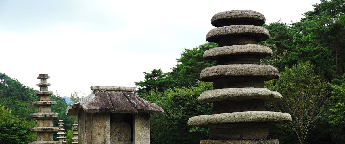 Stone pagodas in a park.
