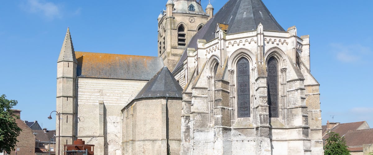 A historic church with a bell tower and a clock.