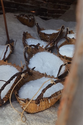 Baskets of salt gathered from salt pans near Kampot on the way from Kep to Sihanoukville.