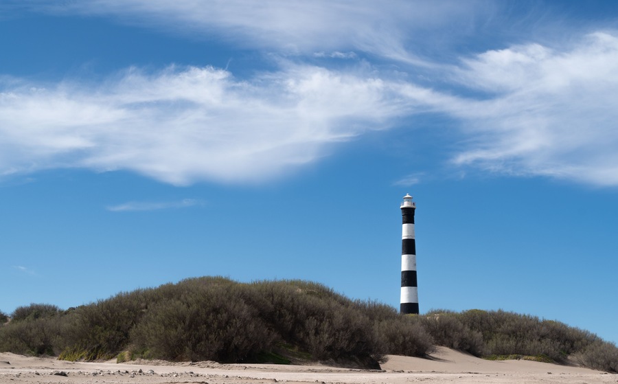 Lighthouse on a dune of sand. Atlantic coast of South America. Claromeco, Argentina