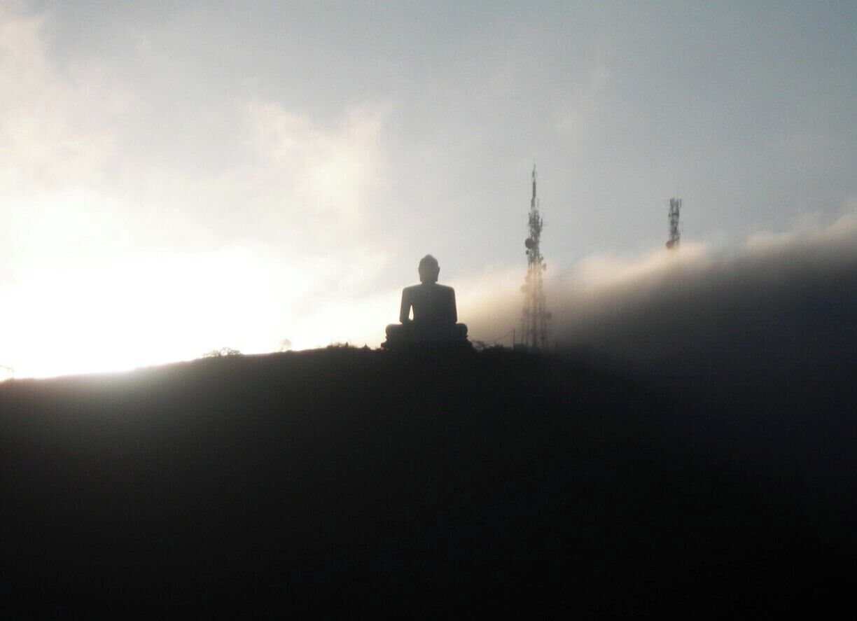 Just before the sun rises over Elephant rock. The Buddha statue is 60m in height. It is considered as one of the highest Buddha statues in Sri Lanka.