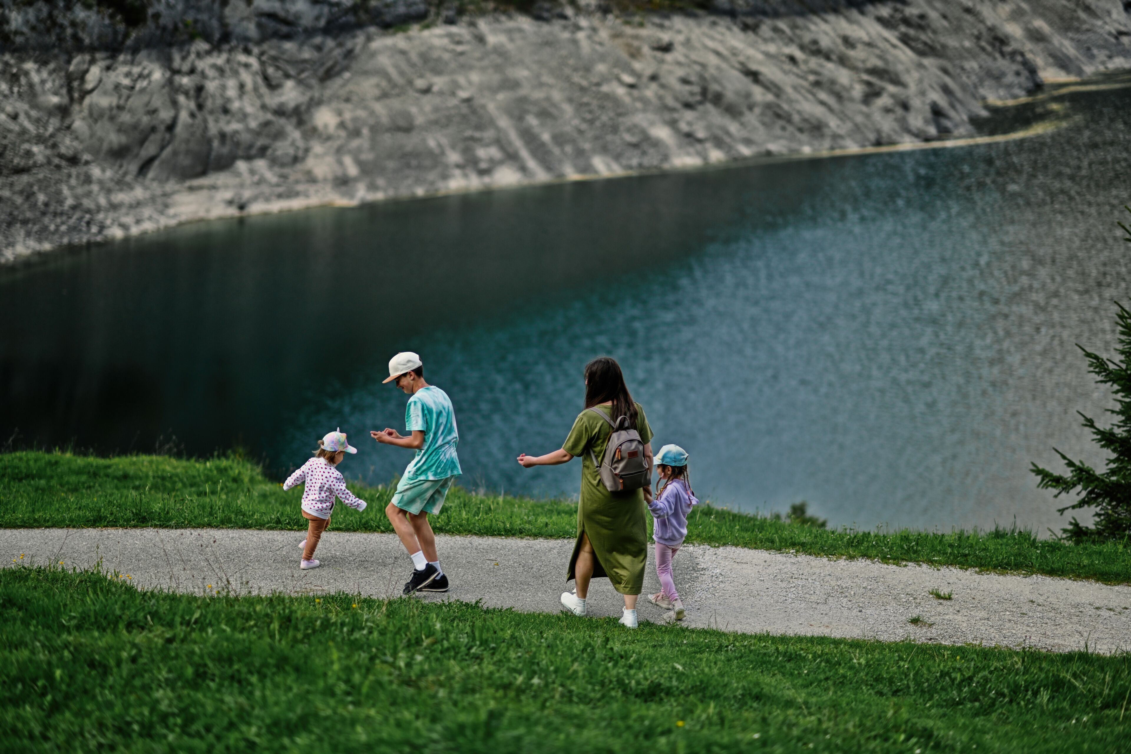 Mother with kids at Vorderer Gosausee, Gosau, Upper Austria.