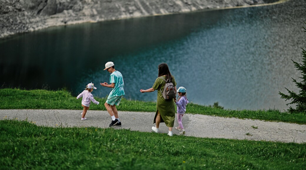 Mother with kids at Vorderer Gosausee, Gosau, Upper Austria.