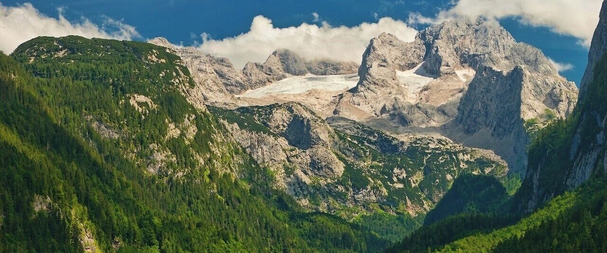 July 2015
Vorderer Gosausee, Austria
Northwest side of Dachstein massif as seen from the lake Vorderer Gosausee. This mountain lake is extremely clean and being filled from the Gosau glacier above. The massif walls are prominent almost 2.000 meters over the lake, which is a popular visitors spot.
