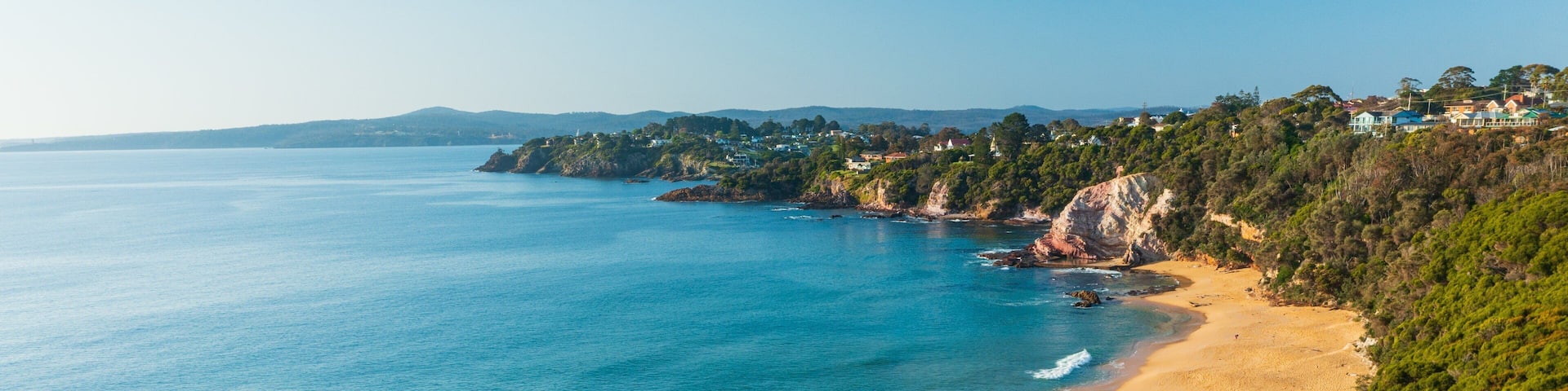 Aslings Beach showing general coastal views, a sandy beach and landscape views