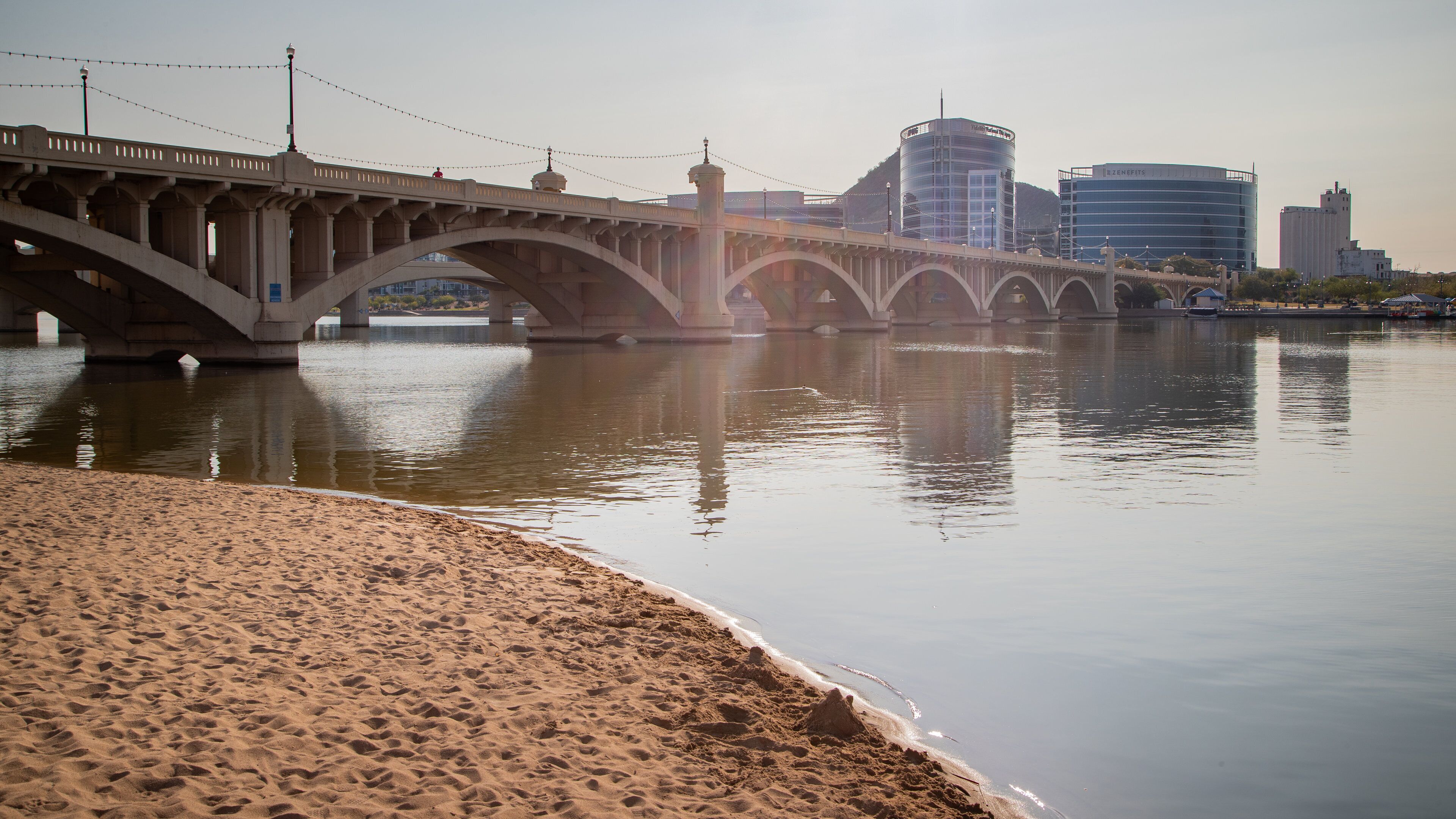 Tempe Town Lake which includes a bridge, a beach and a river or creek