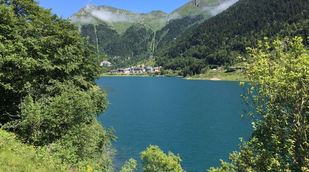 A photo of the lake, and the ski slopes in the background