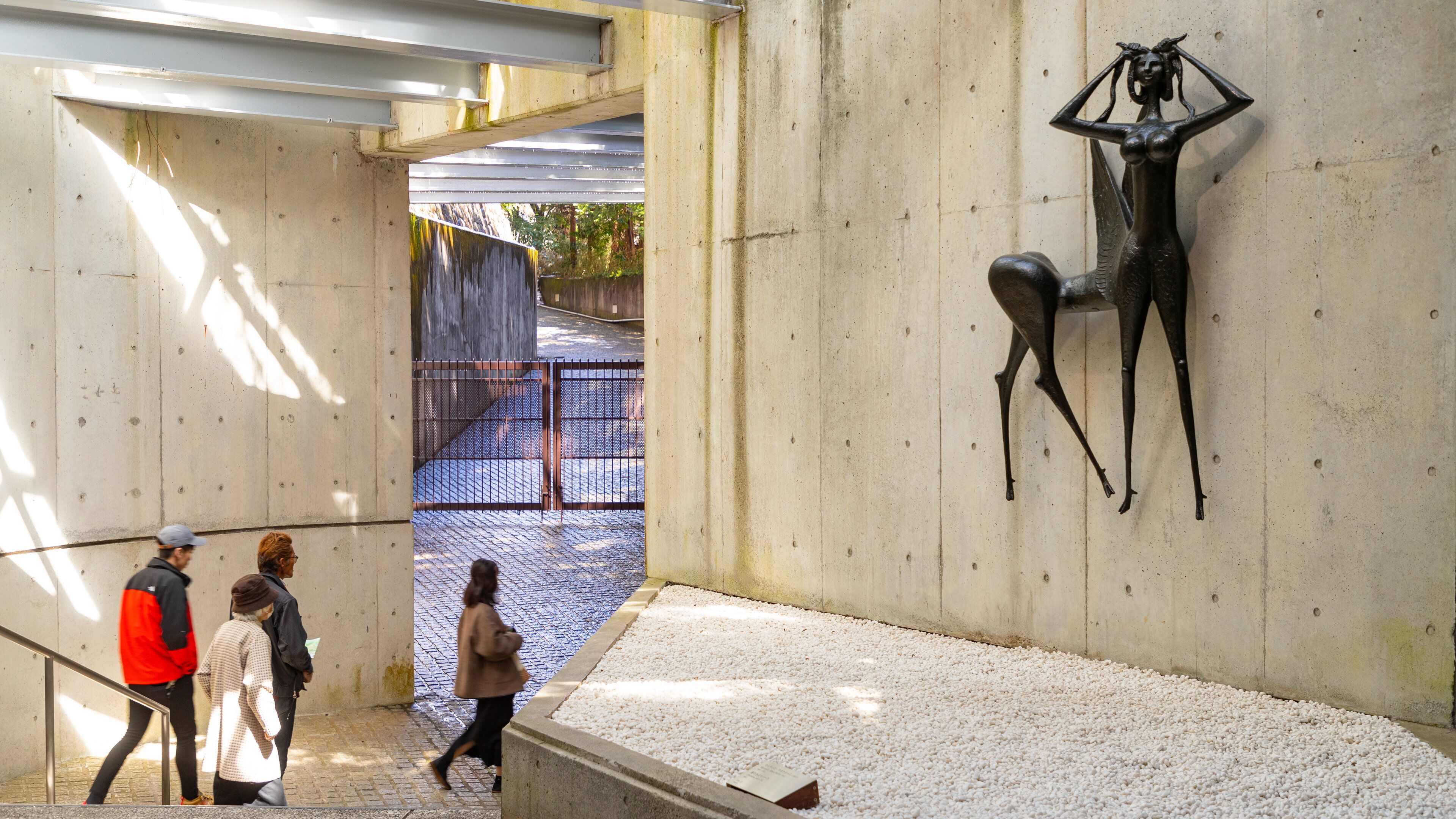 Hakone Open Air Museum showing outdoor art as well as a small group of people