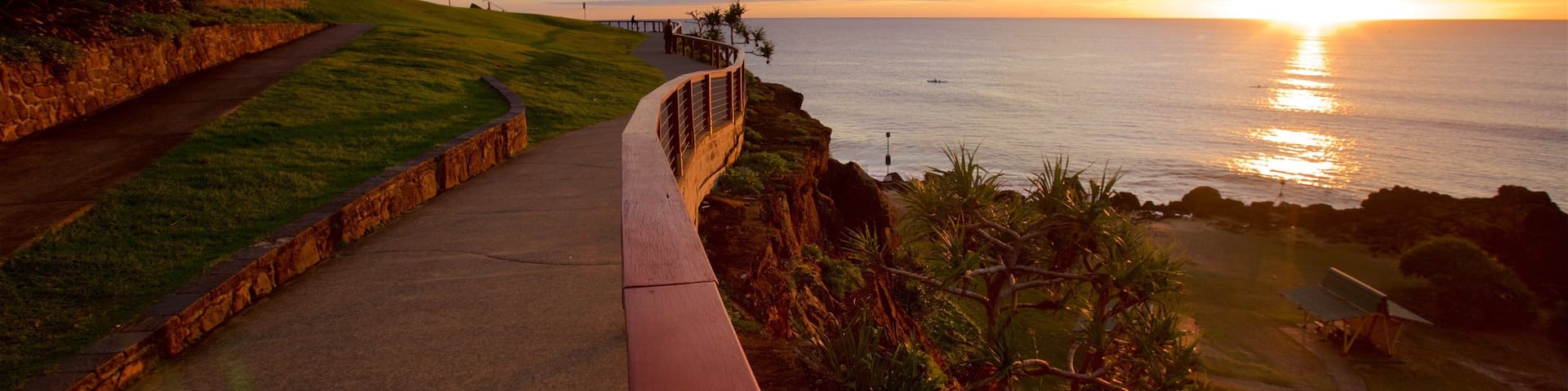 Point Danger which includes a sunset and general coastal views