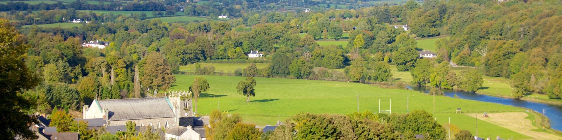 Kilkenny which includes landscape views, tranquil scenes and a small town or village