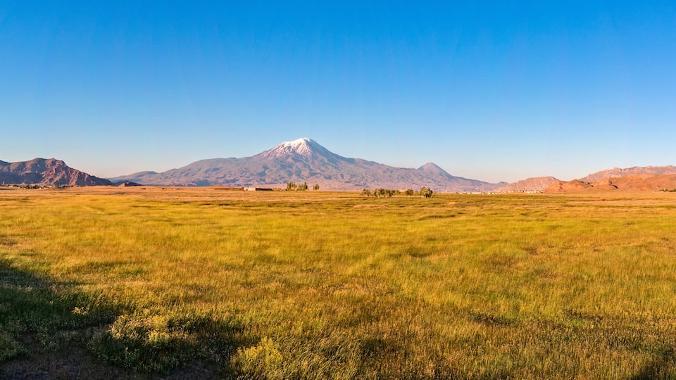 Aerial view of Mount Ararat, Agri Dagi. The highest mountain in Turkey on the border between the region of Agri and Igdir. The resting place of Noah's Ark. City of Dogubayazit in the background