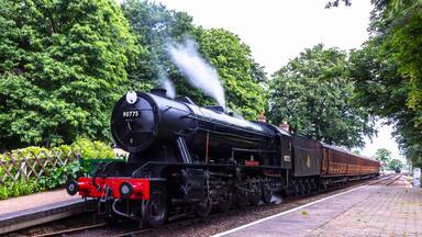 Poppy Line steam train, "The Royal Norfolk Regiment" seen waiting at Holt station in Norfolk, taken 9th July 2021.