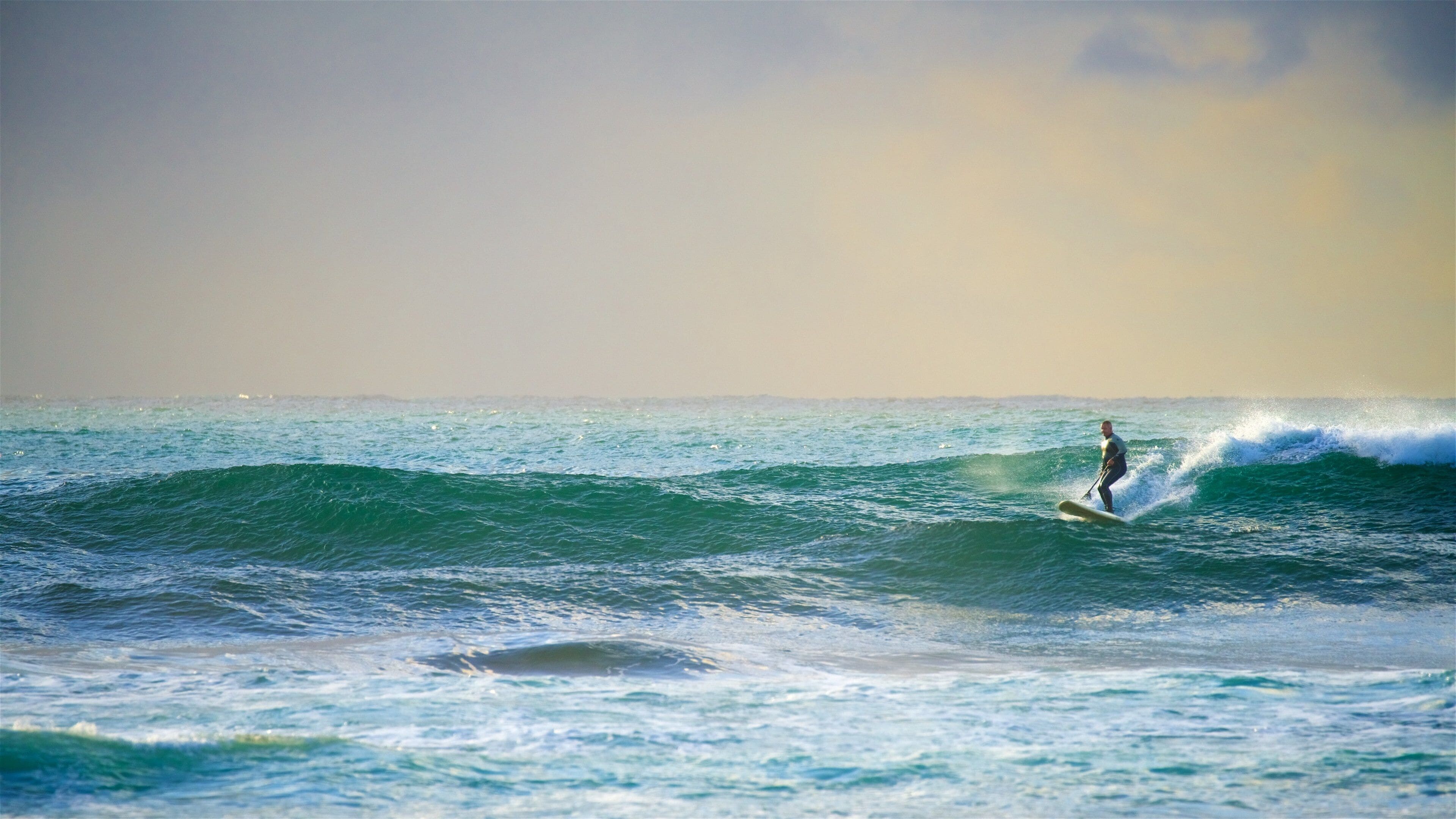 Blue Bay featuring surfing, a bay or harbor and surf