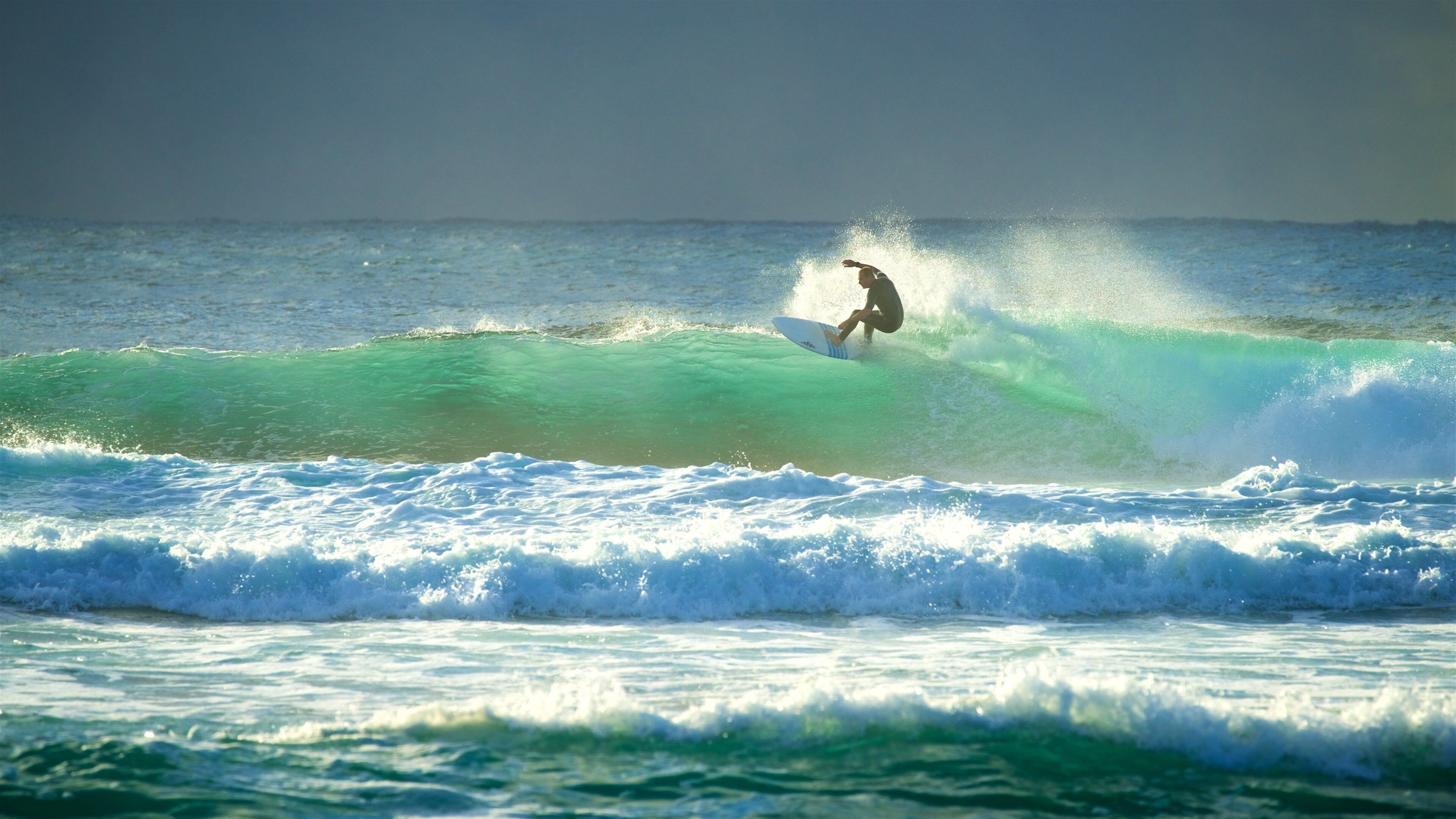 New South Wales showing surfing, waves and a sunset