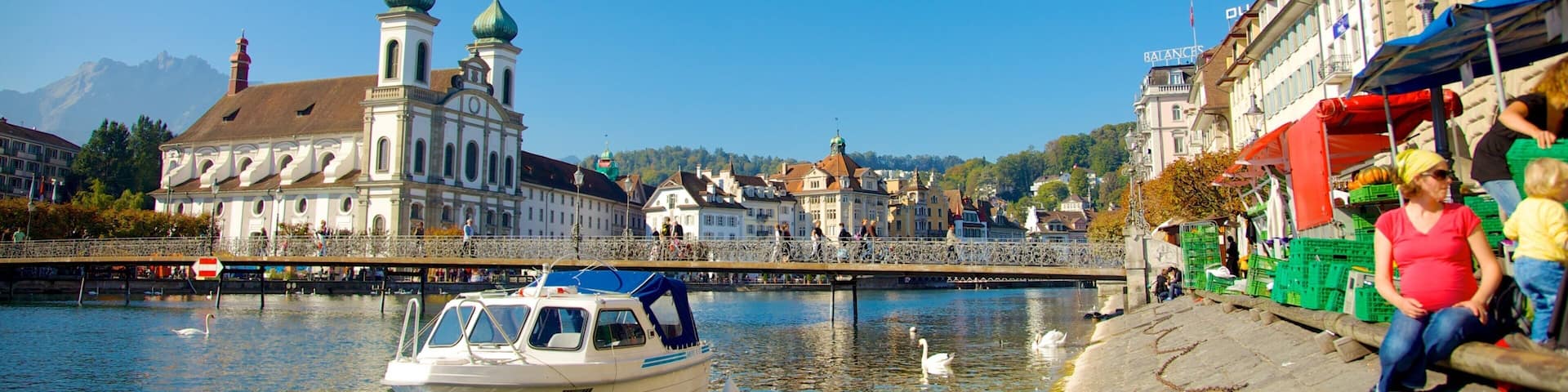 Old Town Lucerne showing a church or cathedral, religious elements and a bridge