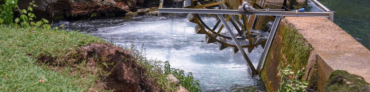 An old waterwheel in a park in Tuscumbia, Alabama