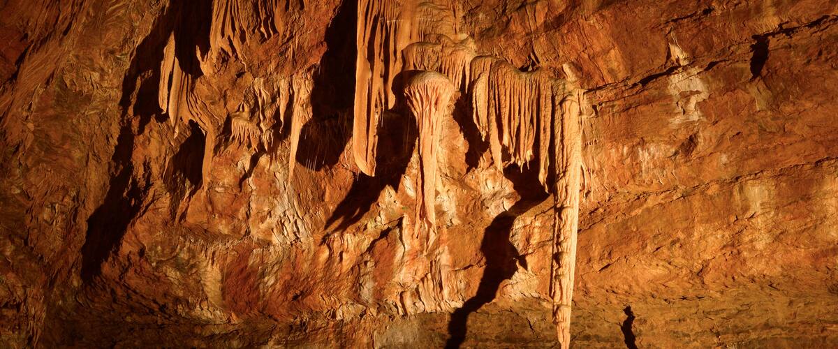 A cave with stalactites and stalagmites.